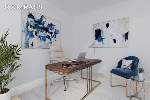 office area featuring hardwood / wood-style floors