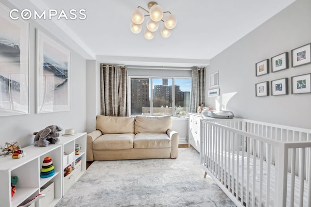 1400 5th Ave Unit 6K, New York City, NY 10026 - bedroom with a chandelier and a nursery area