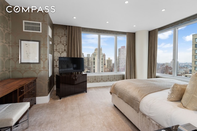 bedroom featuring wallpapered walls, baseboards, visible vents, and recessed lighting