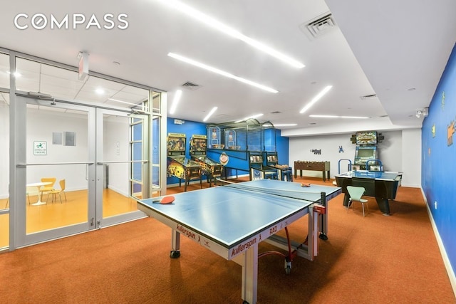 game room featuring baseboards, visible vents, carpet flooring, and french doors