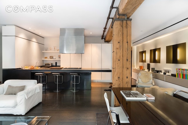 living area featuring recessed lighting and wood finished floors