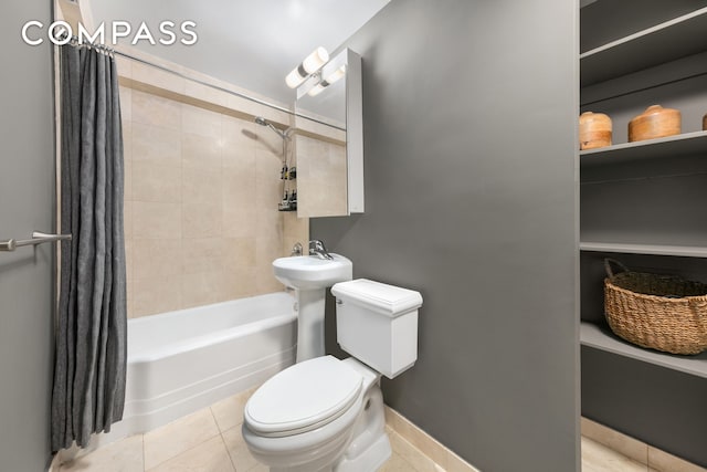420 E 64th St Unit E3A, New York City, NY 10065 - bathroom with shower / tub combo, toilet, and tile patterned floors