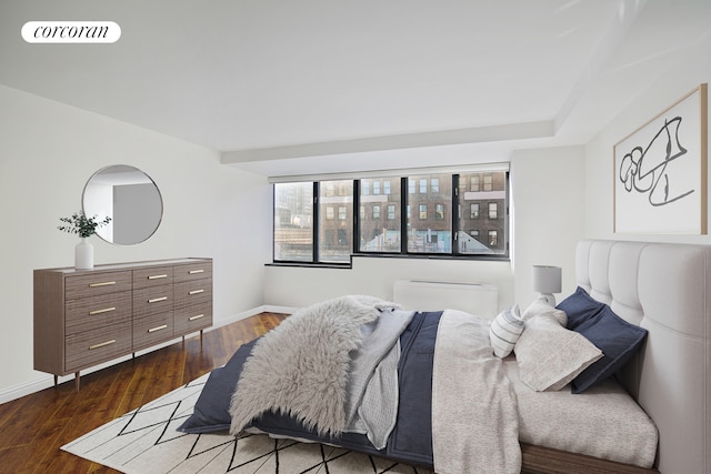 211 Madison Ave Unit 16B, New York City, NY 10016 - bedroom featuring dark wood finished floors and baseboards