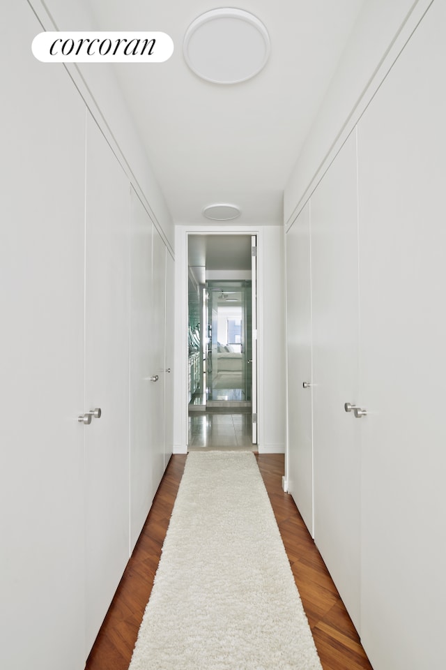 211 Madison Ave Unit 16B, New York City, NY 10016 - corridor with dark wood-style flooring