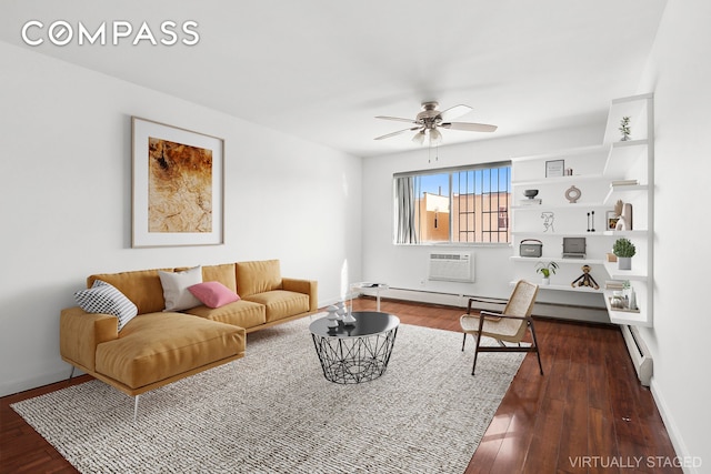 living area featuring a baseboard heating unit, a ceiling fan, baseboards, an AC wall unit, and dark wood finished floors