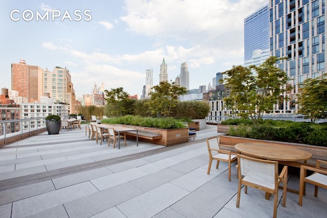 view of patio with a city view