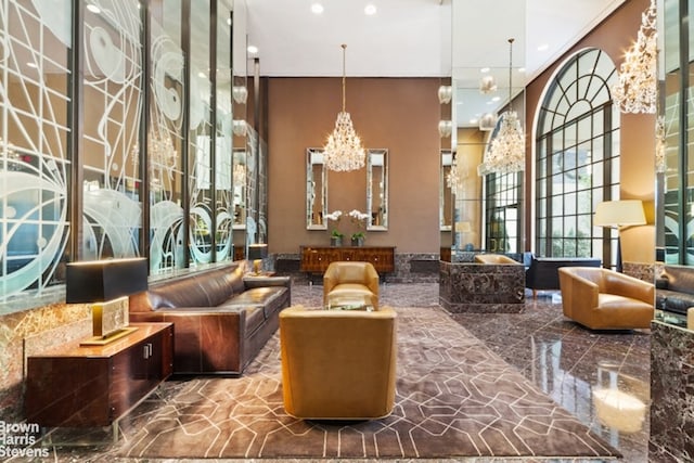 10 W 66th St Unit 22Abc, New York City, NY 10023 - building lobby with a high ceiling and recessed lighting
