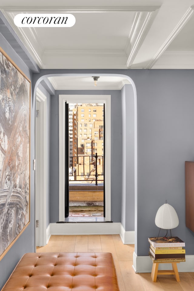 333 E 53rd St Unit 11A, New York City, NY 10022 - corridor featuring arched walkways, ornamental molding, tile patterned flooring, and baseboards