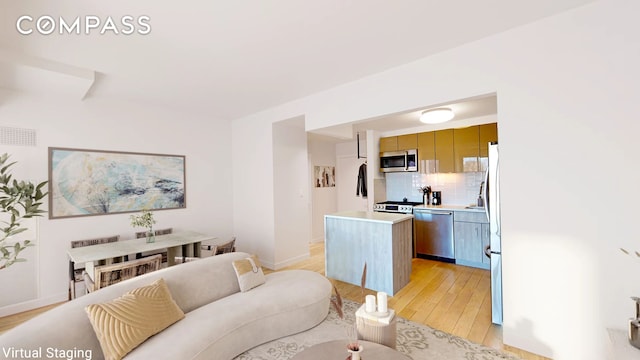 171 W 131st St Unit 620, New York City, NY 10027 - living room with light wood finished floors and baseboards