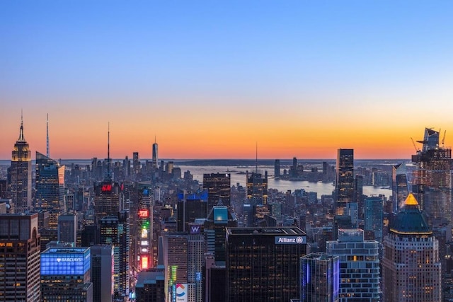 property's view of city with a water view