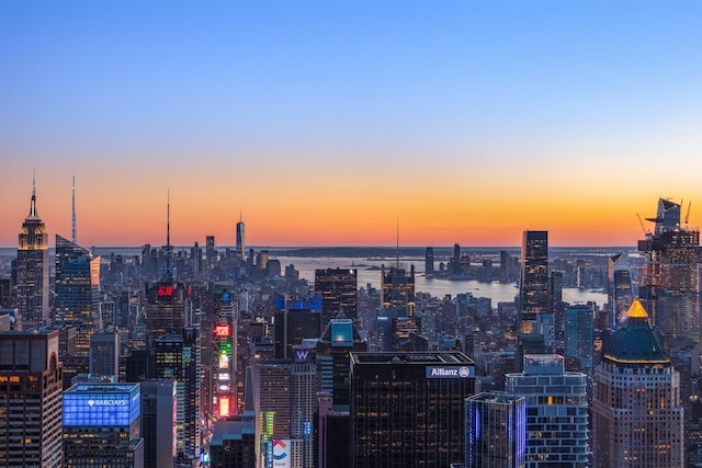 property's view of city featuring a water view