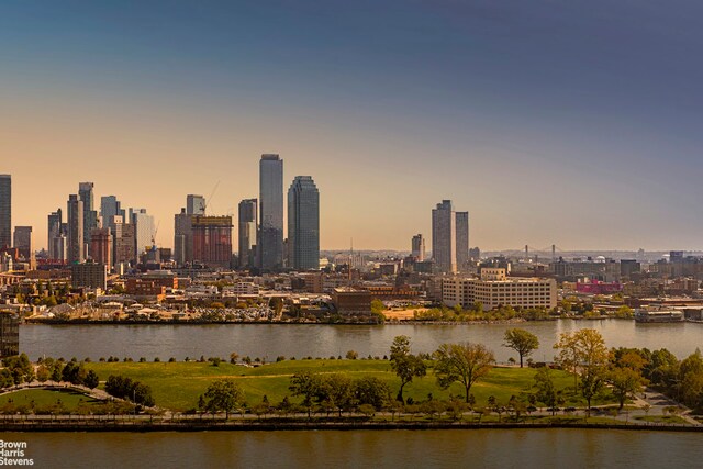 25 Sutton Pl S Unit 20J, New York City, NY 10022 - view of city skyline with a nearby body of water