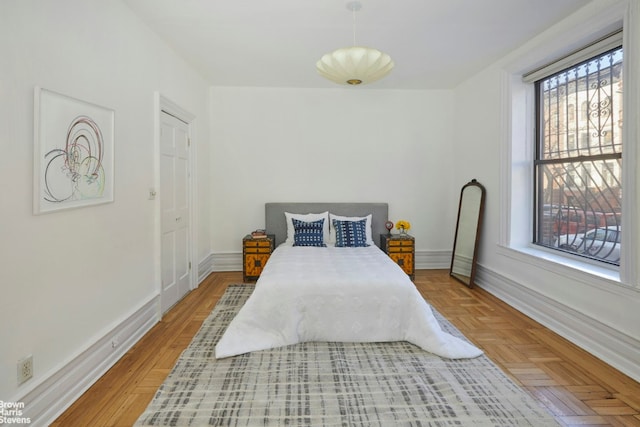 bedroom with parquet floors