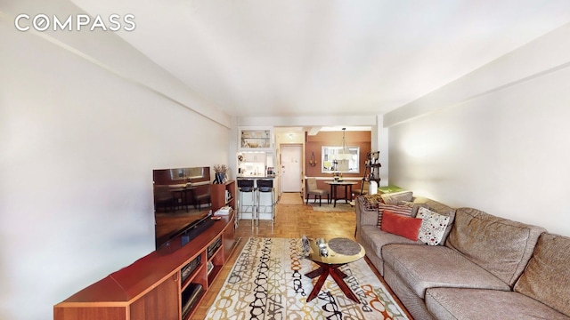 living room with light parquet floors