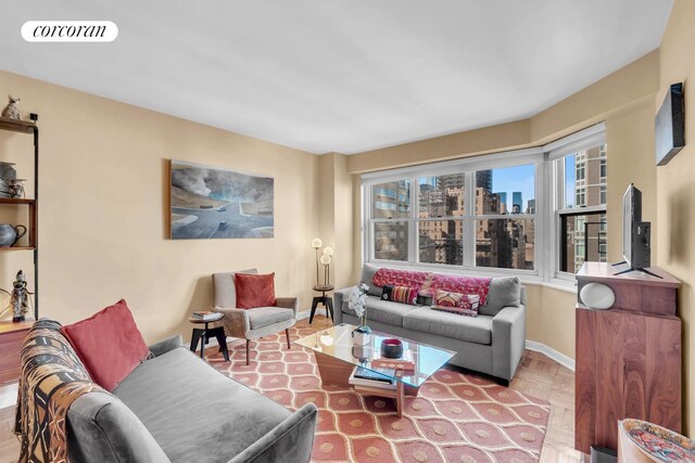 living room featuring parquet flooring