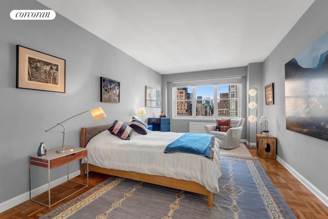 bedroom with parquet flooring