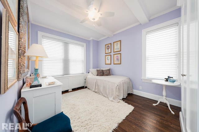 bedroom with beam ceiling, dark wood-style floors, crown molding, baseboards, and ceiling fan