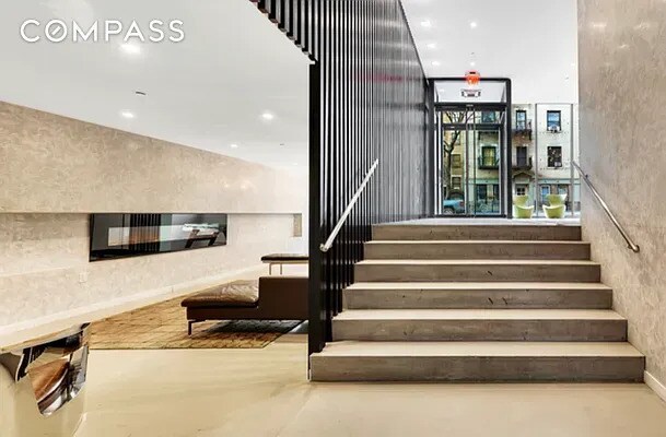 540 W 49th St Unit 406N/407N, New York City, NY 10019 - stairs featuring recessed lighting and concrete floors