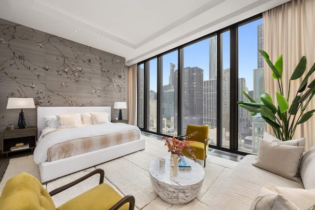 bedroom featuring expansive windows