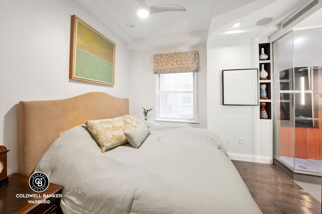 bedroom featuring dark wood-type flooring