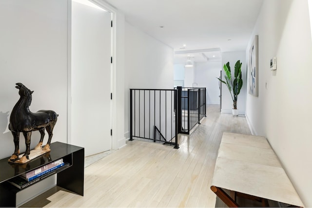 416 W 52nd St Unit Th213, New York City, NY 10019 - hallway featuring an upstairs landing and light wood-type flooring