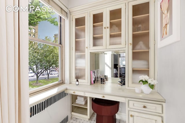 office area featuring radiator heating unit