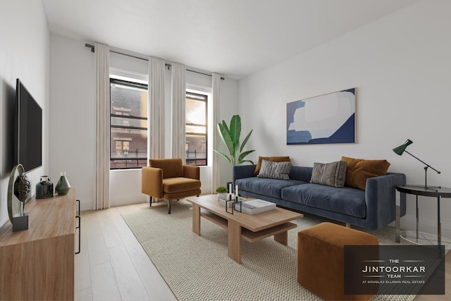 living area with light wood-style floors