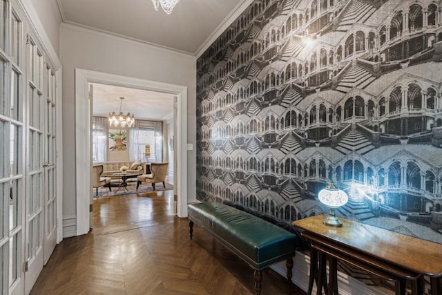 hallway featuring an inviting chandelier, parquet floors, and crown molding