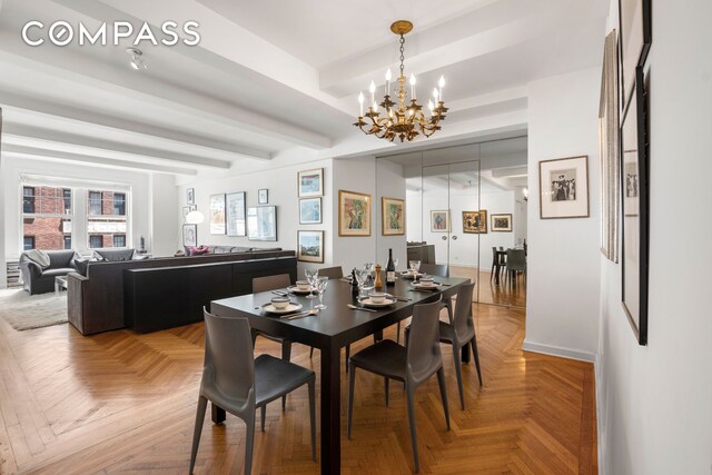 dining space with parquet floors, beam ceiling, and a notable chandelier