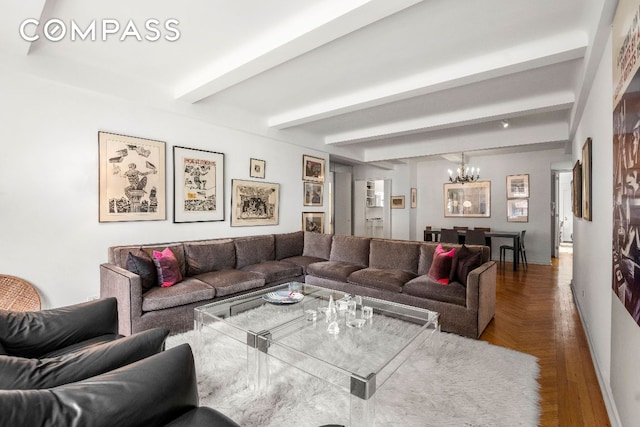 living room with parquet flooring, beam ceiling, and a notable chandelier