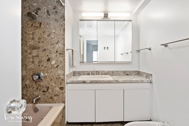 full bath featuring shower / bathing tub combination and vanity