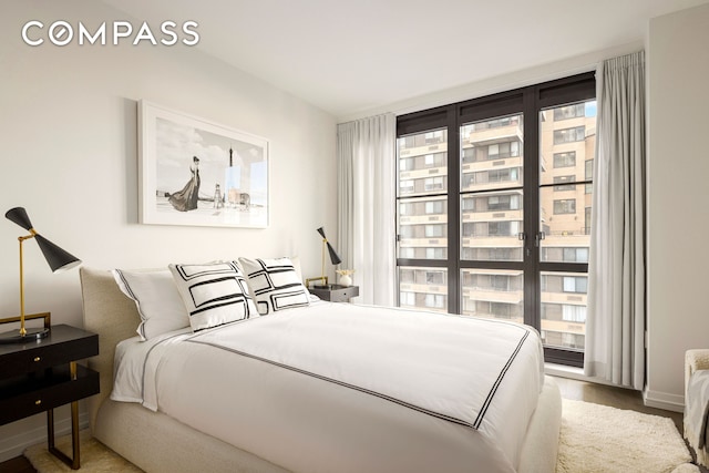 250 W 96th St Unit 9C, New York City, NY 10025 - bedroom featuring wood finished floors