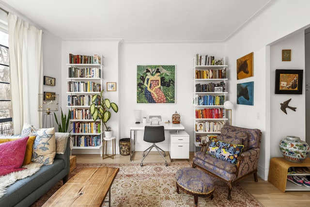 224 E 17th St Unit 2F, New York City, NY 10003 - sitting room featuring wood finished floors, healthy amount of natural light, and a desk