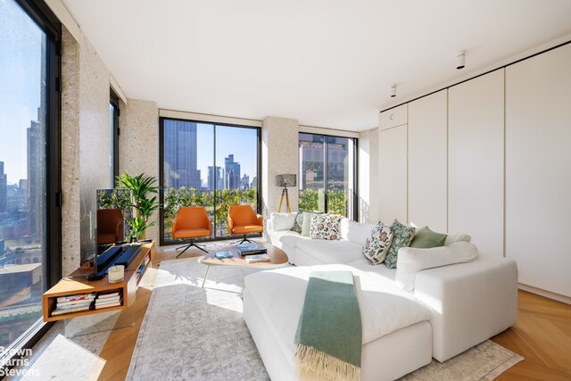 living room with floor to ceiling windows