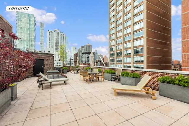 view of patio featuring a view of city