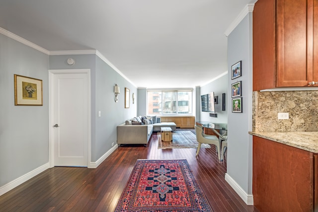 living room featuring ornamental molding and dark wood-type flooring