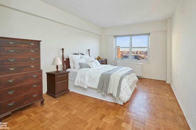 bedroom featuring radiator heating unit