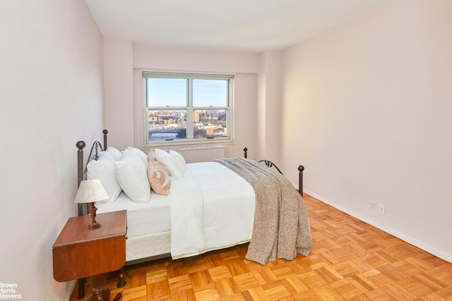 bedroom featuring baseboards