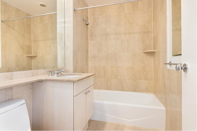 full bathroom featuring bathtub / shower combination, vanity, and toilet