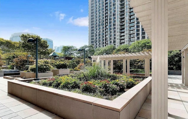 view of property's community featuring a pergola