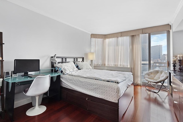 bedroom featuring access to outside, crown molding, and wood-type flooring