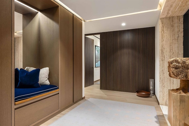 mudroom with light wood-style floors