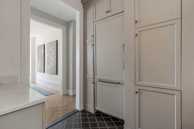 interior space with dark parquet flooring