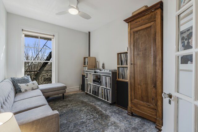 living room featuring ceiling fan