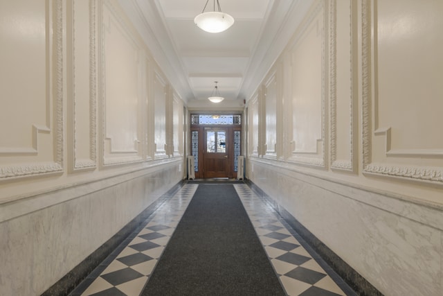 entryway featuring ornamental molding