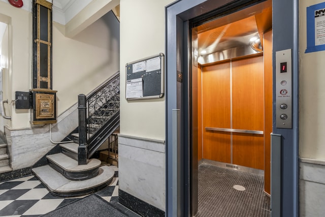 entrance to property featuring elevator