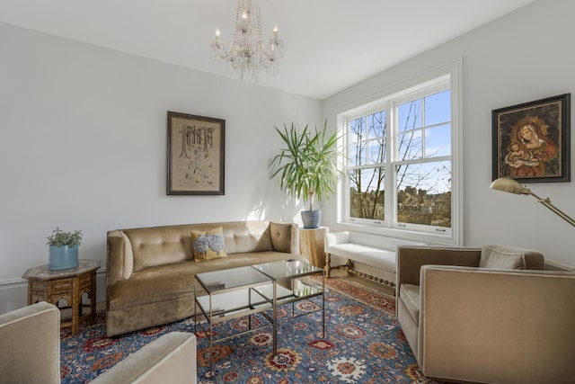 living room with a notable chandelier