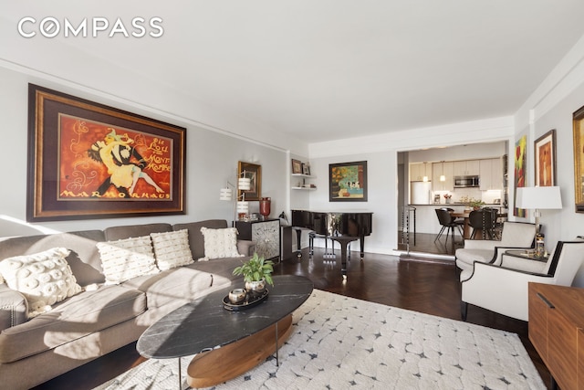 living room featuring parquet floors