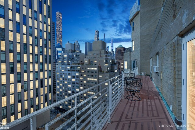 205 E 63rd St Unit 18C, New York City, NY 10065 - balcony featuring a skyline view and cooling unit