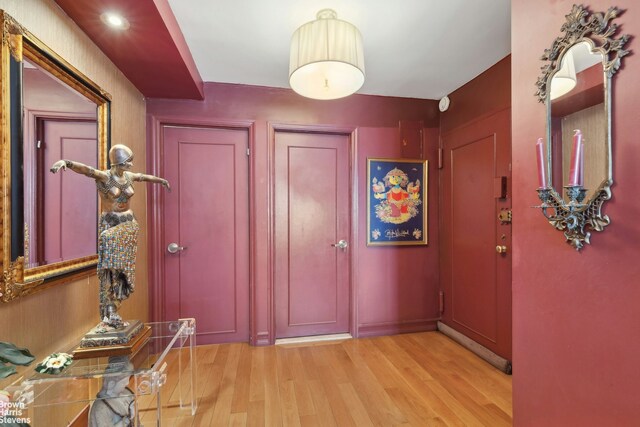 205 E 63rd St Unit 18C, New York City, NY 10065 - foyer entrance with light wood finished floors